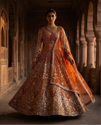 Rust Orange Heavily Embroidered Silk Lehenga Choli Set with Backless Tassel Detail and Intricate Silver Zari Work